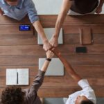 Business Model - Photo Of People Doing Fist Bump