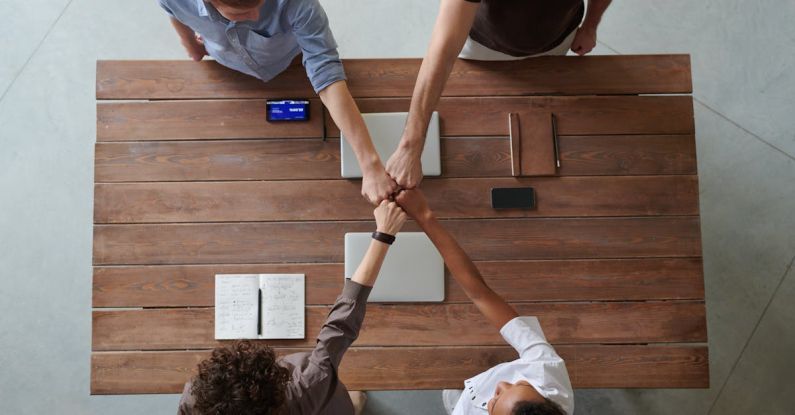 Business Model - Photo Of People Doing Fist Bump