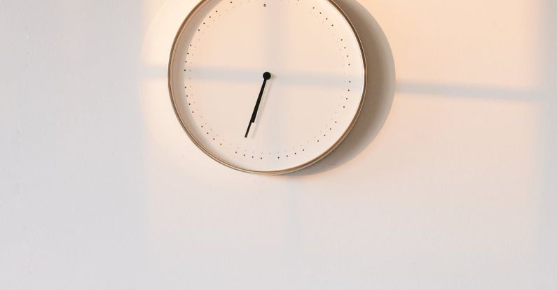 Early Challenges - Round White Analog Wall Clock at 10 10
