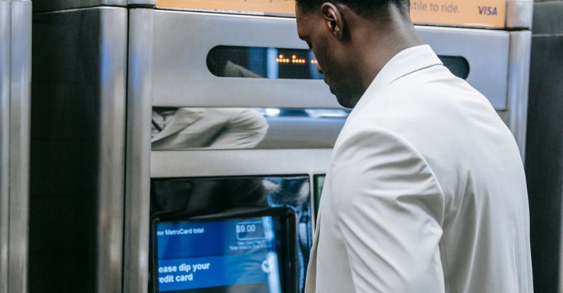 Financial Automation - Man using an Automated Teller Machine