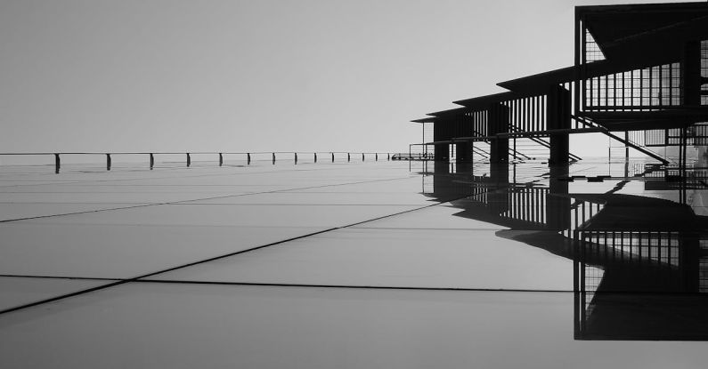 Qualities - Grayscale Photography of Bridge